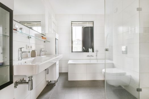 Luxurious bathroom with white tiles