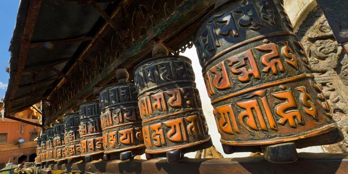 Tibetan copper prayer wheels, Swayambhunath Temple, Kathmandu, Nepal