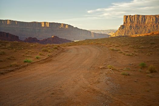 Raw Utah Desert Landscape - Sandy Backcountry Road near Moab, Utah, USA. 