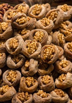 Pile of whole walnuts  without nutshells in fig