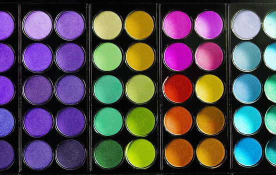 Colorful makeup palette with makeup brush