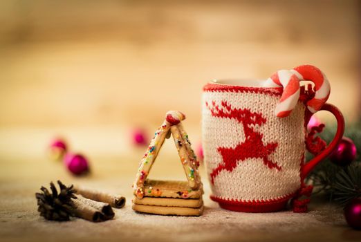 Christmas mug with decorations and sweets
