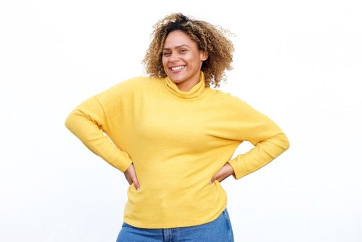 curvy african american woman smiling against isolated white background