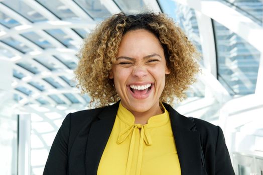 Close up business woman laughing