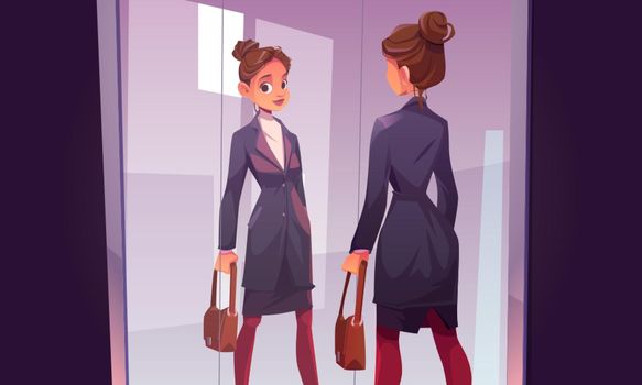 Business woman looks in big mirror