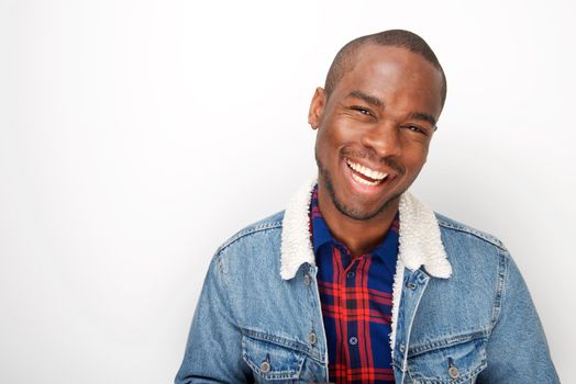 happy african american man laughing with denim jacket 