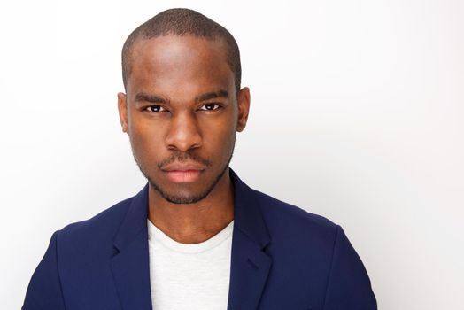 Close up young black man with staring serious expression 