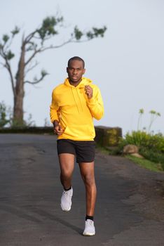 Full body african american exercise man running on street