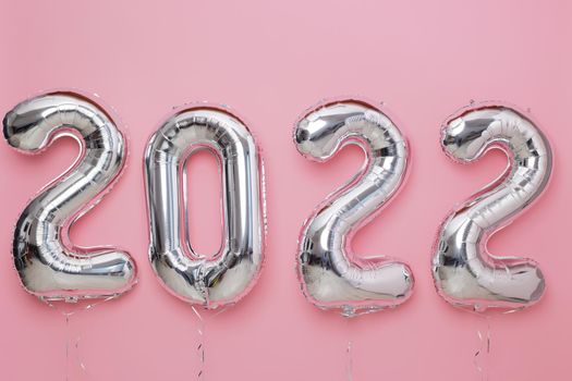 Balloon number 2022 New year 2022 celebration Decorative design elements pink background. High quality photo