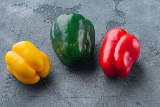 Sweet bell peppers, on gray background