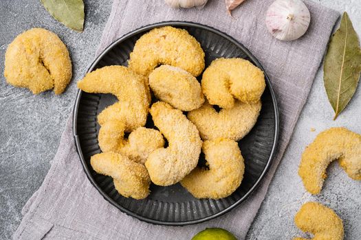 Breaded Deep Fried shrimps, on gray stone table background