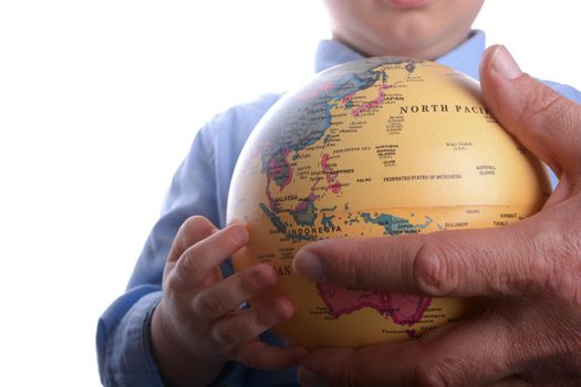 Baby holding a globe
