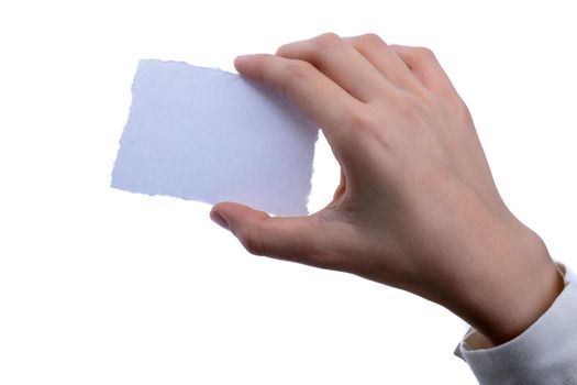  blank torn notepaper in hand