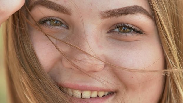 Close up of young smiling girl face.