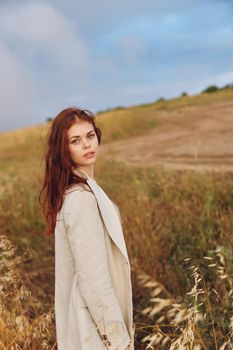 pretty woman wheat countryside landscape freedom sunny day. High quality photo