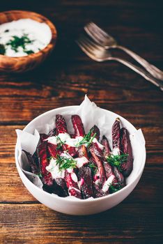 Oven baked beet with yogurt and dill dressing