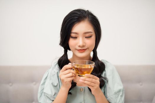 Drink. Beautiful Woman Drinking Tea From Cup