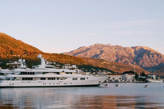 Luxurious double-deck superyacht docked in Porto. Montenegro