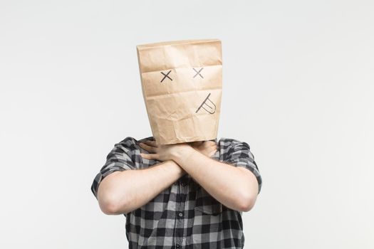 Portrait of men in dead paper bag mask
