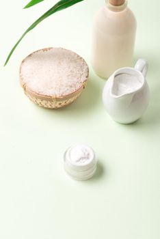 Vegan rice milk, non dairy alternative milk in a glass bottle close up