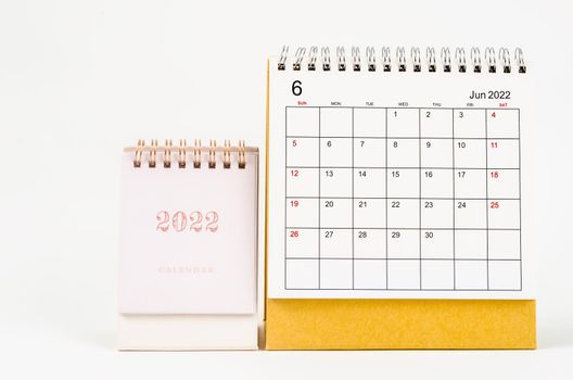 June 2022 desk calendar on white background.