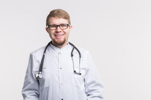 Handsome white doctor men in glasses and white medical gown