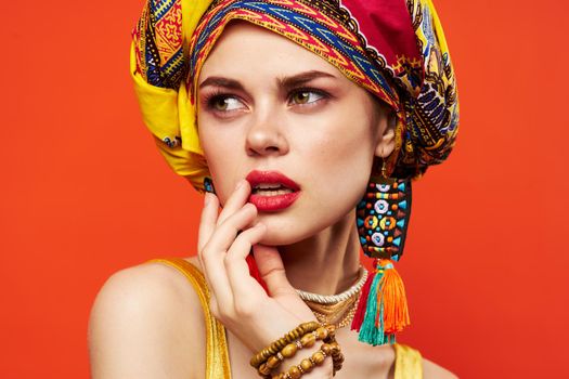 beautiful woman multicolored shawl ethnicity african style decorations red background