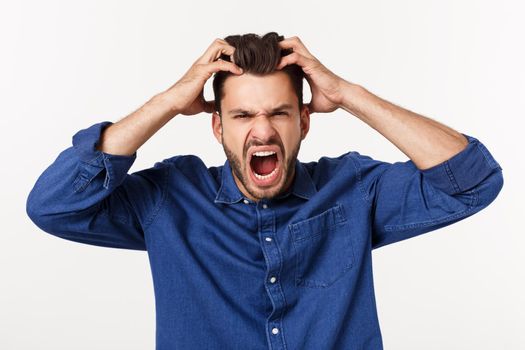 young office worker mad by stress screaming isolated on white.