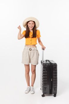 Woman tourist. Full length happy young woman standing with suitcase with exciting gesturing, isolated on white background.