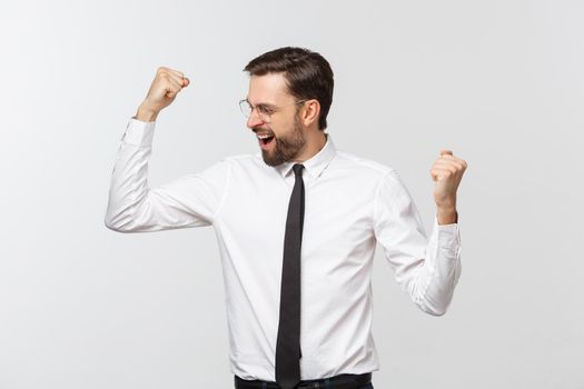 Very happy successful gesturing business man, isolated on white