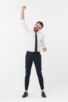 full-length portrait of happy businessman in formal wear with raising hands up. isolated on white background.