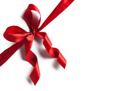 Red ribbon bow isolated on white