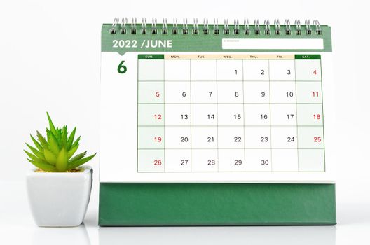 June 2022 desk calendar on white background.