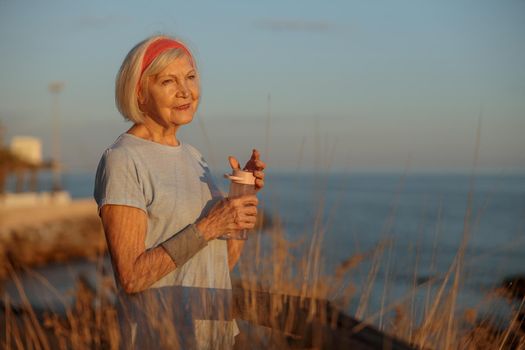 Female pensioner have happiness by exercising outdoors