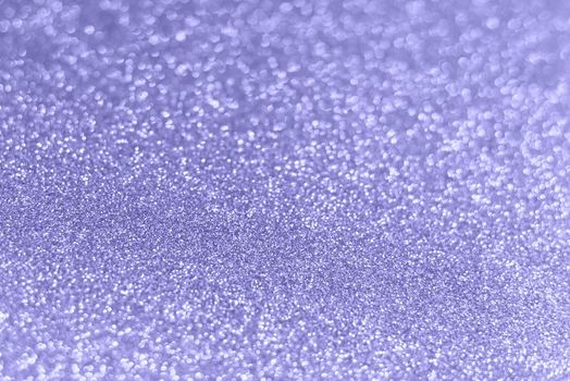 The color of 2022 is very peri. Shiny background in purple color of the year. Close up, texture background, trendy color, trending concept.