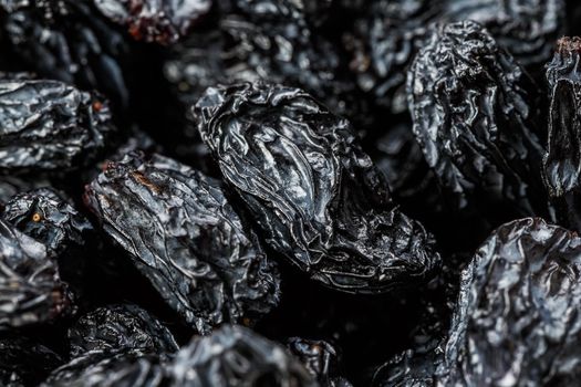 Black Raisin texture, popular dried fruit. Dried grapes.