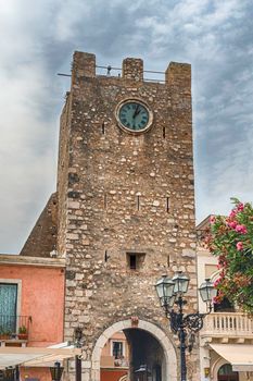 Ancient clocktower, iconic landmark in Taormina, Sicily, Italy