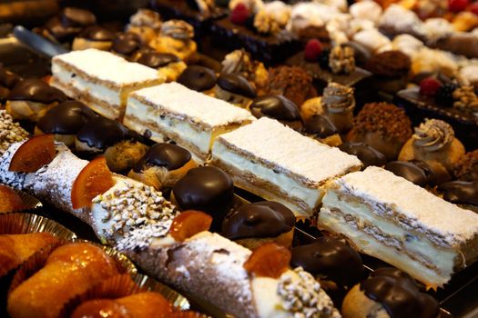 Italian sand French sweets in cake shop display