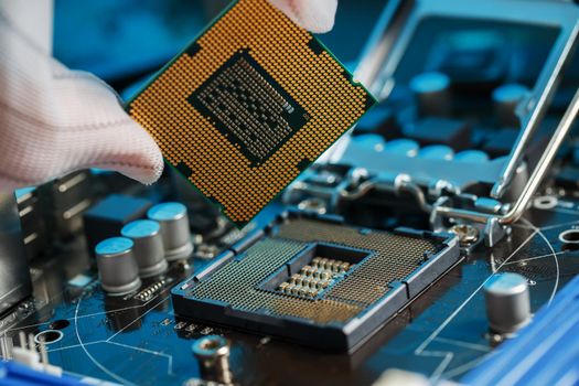 Electronic engineer of computer technology. Maintenance computer cpu hardware upgrade of motherboard component. Pc repair, technician and industry support.