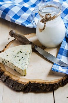 Blue cheese on rustic background