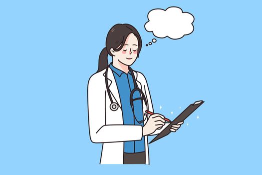 Woman doctor in uniform write prescription