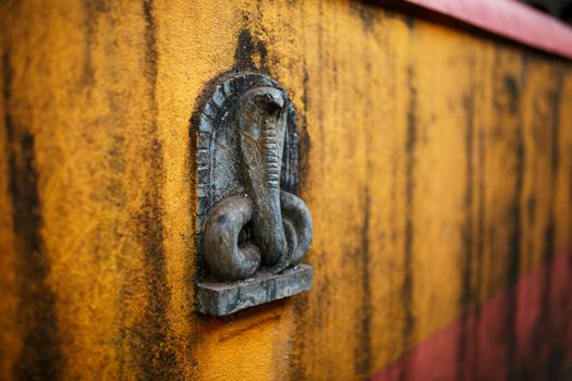 A small statue of the Snake, the temple of the serpent in India Gokarna