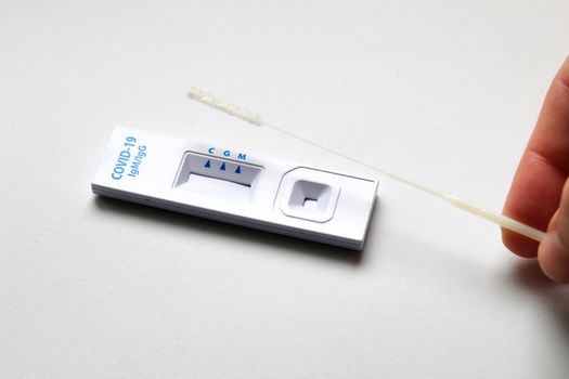 Rapid Diagnostic test cassette on white background