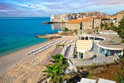Dubrovnik. Banje beach and historic walls of Dubrovnik view