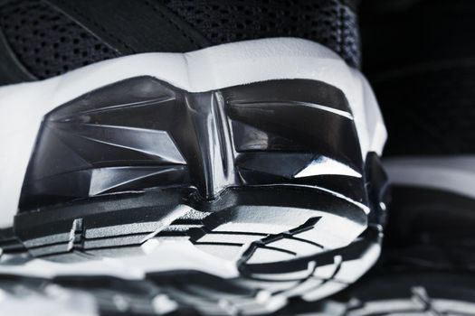 Close-up of black and white gel cushioning sports shoe sole