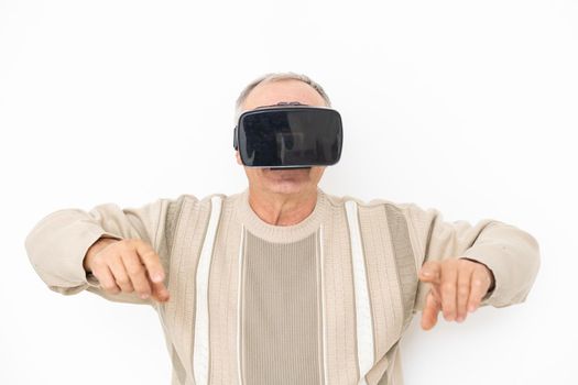 Senior man using VR Goggles