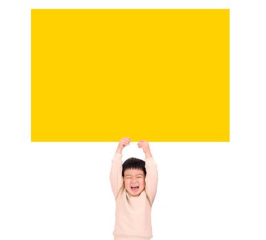 Happy Little boy holding empty yellow board