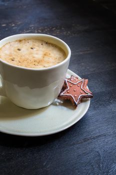 Cup of cappuccino with festive decor