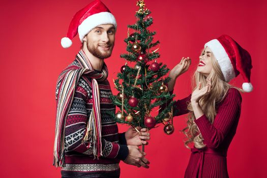 cheerful young couple romance christmas holiday family. High quality photo