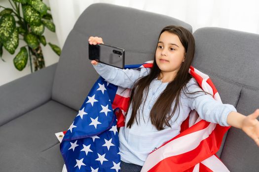 Learn English Language Online Education Concept, little girl and american flag.